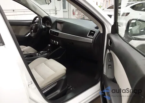 2016 Mazda Cx-5 Touring z USA, uszkodzony, nr VIN JM3KE2CYXG0871514